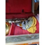 A Clarinet by Boosey & Hawkes, and an imported Saxophone, in case (make and model is Selmer, London)