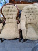A Victorian button back open armchair and one other on turned front legs