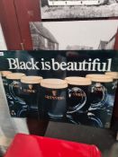 Guinness sign "Black is Beautiful"