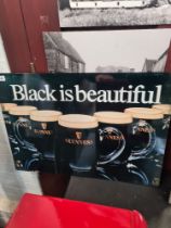 Guinness sign "Black is Beautiful"