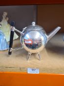 A reproduction Christopher Dresser style teapot