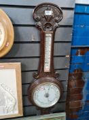 An early 20th century, carved oak Banjo barometer