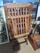 Two wooden folding outdoor chairs