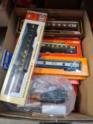 A carton of Railway OO Gauge and HO Gauge carriages, boxed to include Mainline, ROCO, LIMA and Tri-a
