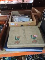 A quantity of old postcards, some in albums and 4 unframed pictures