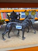 Bronze statue of a pair of dogs