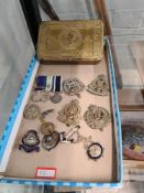 A World War I Princess Mary Christmas tin, a set of three miniature medals to include the South Atla