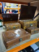 Four small oriental carved chests