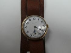 ROLEX; A 1920/1930s Gent’s 9ct gold cased Rolex watch with signed white enamel dial, black numbers a