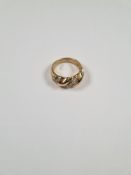 9ct yellow gold ring of twisted form, each other panel inset clear stones, marked 375, maker PK, siz
