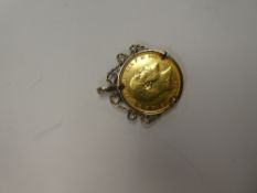 22ct yellow gold full Sovereign dated 1909, George V & George & The Dragon, in 9ct gold pendant moun