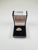 10K yellow gold dress ring with central square panel chanel set diamonds with tapered square halo an