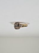 Contemporary 9K gold diamond dress ring with small square panel Chanel set square cut diamonds, squa