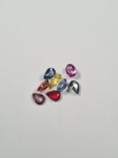 A quantity of mixed coloured fancy cut Ceylon heat treated Sapphires (18) approx 7.25 carat