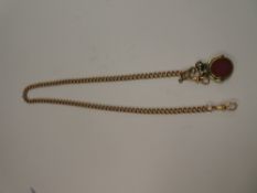 9ct rose gold curb link chain with 2 lobster clasps, hung with a white metal spinning pendant mounte