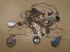 Quantity of modern silver costume jewellery to include gem set pendants, silver earrings, etc