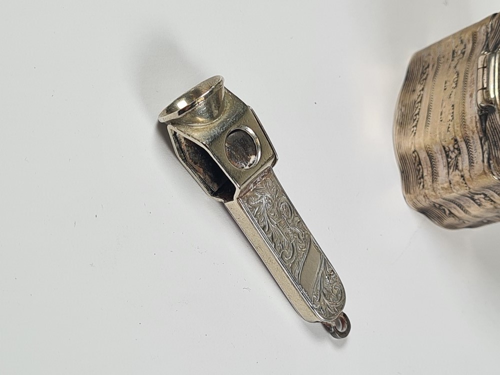 A decorative silver cigarette cutter having a decorative body covered in foliate scrolls, by Henry C - Image 11 of 12