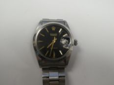 Rolex; A 1960s Stainless Steel 'Rolex Oysterdate' Precision wristwatch with black signed dial, golde