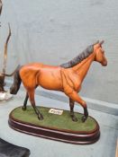 A Royal Doulton figure of Red Rum