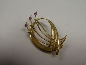 14ct yellow gold decorative brooch with three round cut rubies, 5cm x 2.5cm marked 585, London Impor