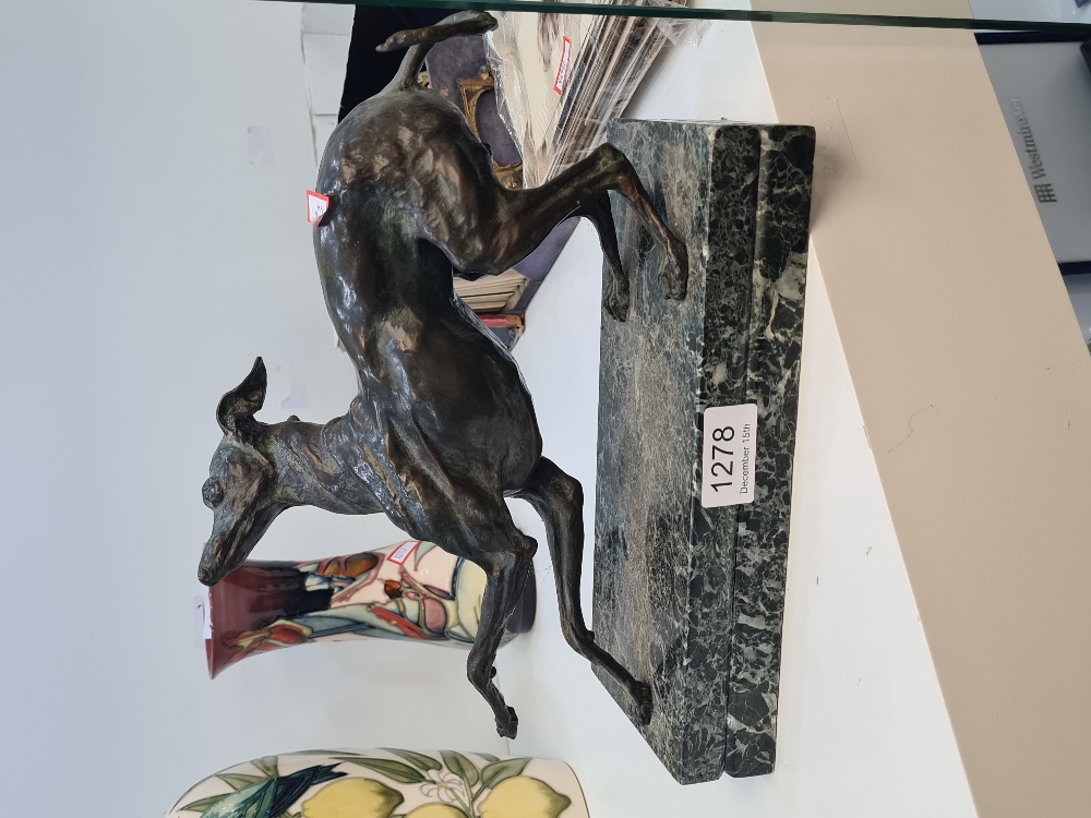 A 20th Century bronze sculpture of Greyhound on oblong marble base, 25cm