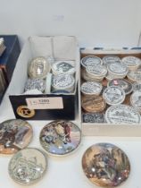 A quantity of antique paste and pot lids and other later examples