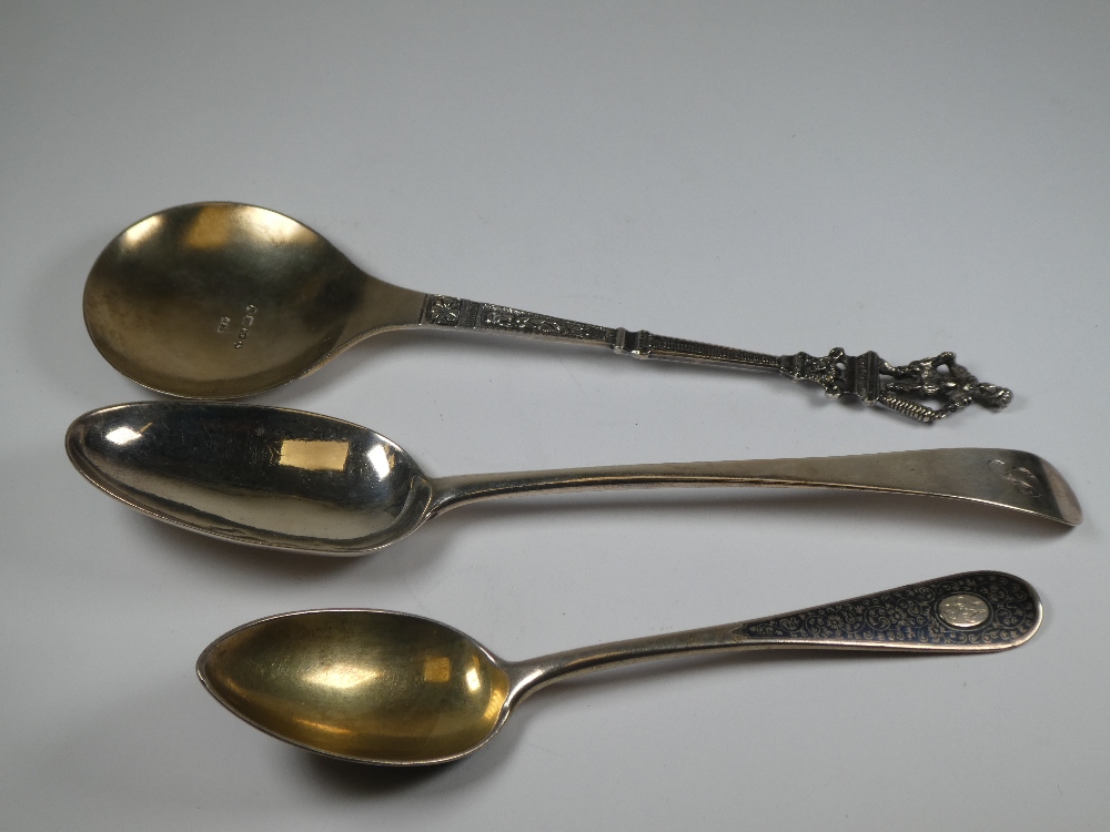 Hester Bateman; a silver Georgian dessert spoon, London, possibly 1774. Also with a silver decorativ