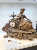 A large 19th Century French gilt mantle clock having Spelter figure of lady reading book A/F, on sta