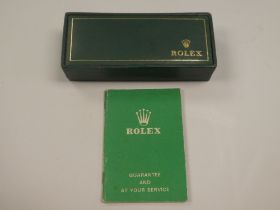 Rolex; A 1960s 9ct yellow gents Rolex Precision watch with circular champagne dial, golden baton mar