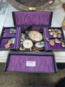 A Victorian leather jewellery box with mixed contents