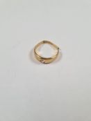 18ct yellow gold ring set with a single diamond, marked 81ct AF, band split and bent, approx 3g