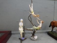 An Albany Worcester figure group of 2 fairies and one other single figure with chipped flowers, tall