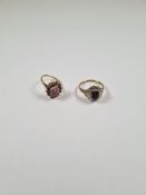 Two 9ct yellow gold cluster rings one a ruby and cubic zirconia example, 2.3g and the other sapphire