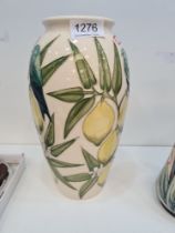 A modern Moorcroft vase decorated lemons and birds, 26cm (some crazing)
