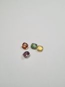 Four coloured cushion cut Sapphires, green, yellow, mauve and orange, 4.59 carat approx