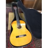 A hard-cased Hohner classical guitar, the Concerta model with ebonised fingerboard, cedar body,