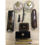 Miscellaneous nineteenth desk items including a pair of inkwells with brass mounts, an inlaid French