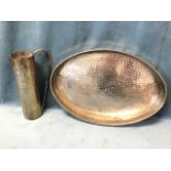 An oval hammered silver plated tray with rolled rim - 20in; and a matching tubular jug with tapering