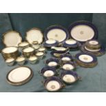 Miscellaneous blue & gilt dinner and tea ware including Royal Doulton in the Rochelle pattern,