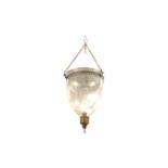 A Victorian glass lantern suspended by chains with brass leaf collar and birdshead chain mounts, the