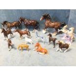A collection of ceramic and glass horses - some Beswick, lustre glazed, foals, a shire horse,