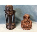 A carved African tribal art female bust with elongated ear lobes - 13.5in; and an eastern carved dog