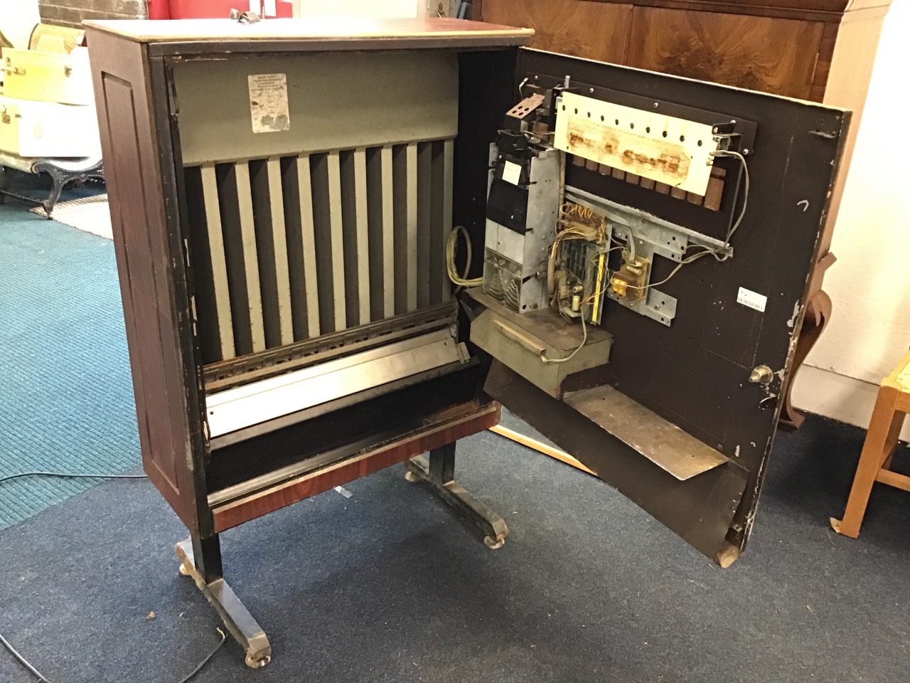 A cigarette vending machine with glass panel in hinged locking door with dispensing trough below, - Image 2 of 3