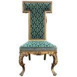 A nineteenth century giltwood hall chair, the moulded T-shaped back and seat with later needlework