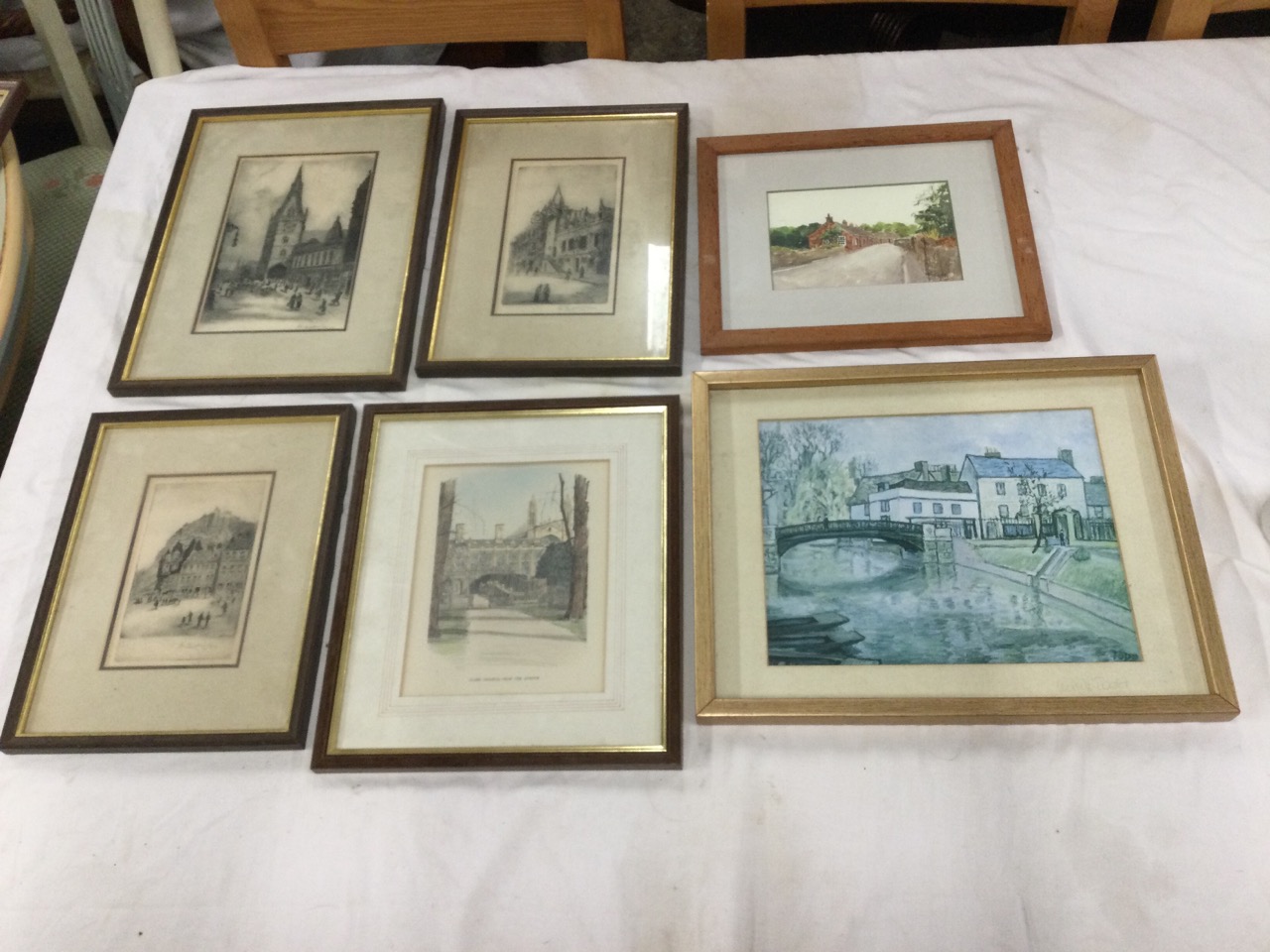 W Laidlaw?, a set of three Edinburgh townscape etchings with figures, signed indistinctly in