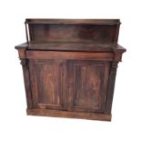 A Victorian rosewood chiffonier, the back shelf supported on turned spindles above a breakfront