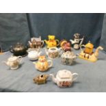 A collection of novelty teapots - Japanese, porcelain, Staffordshire, commemorative, terracotta,