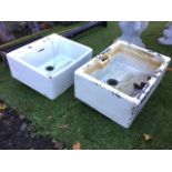 A rectangular glazed belfast sink with flat platform for taps; and another with integral