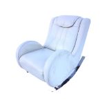 A contemporary Italian ivory leather style rocking chair with panelled cushion back and deco