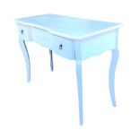 A painted dressing table, the moulded top of breakfront outline having floral carved apron drawer